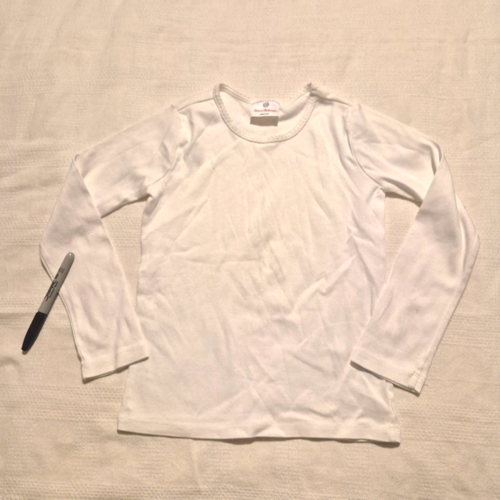 Hanna Andersson girls size 130 or 8 long sleeve white shirt, has marks play cond